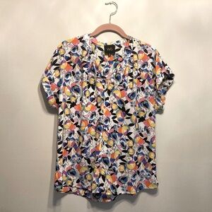 W5 Med Peasant Blouse contemporary floral. Bright.